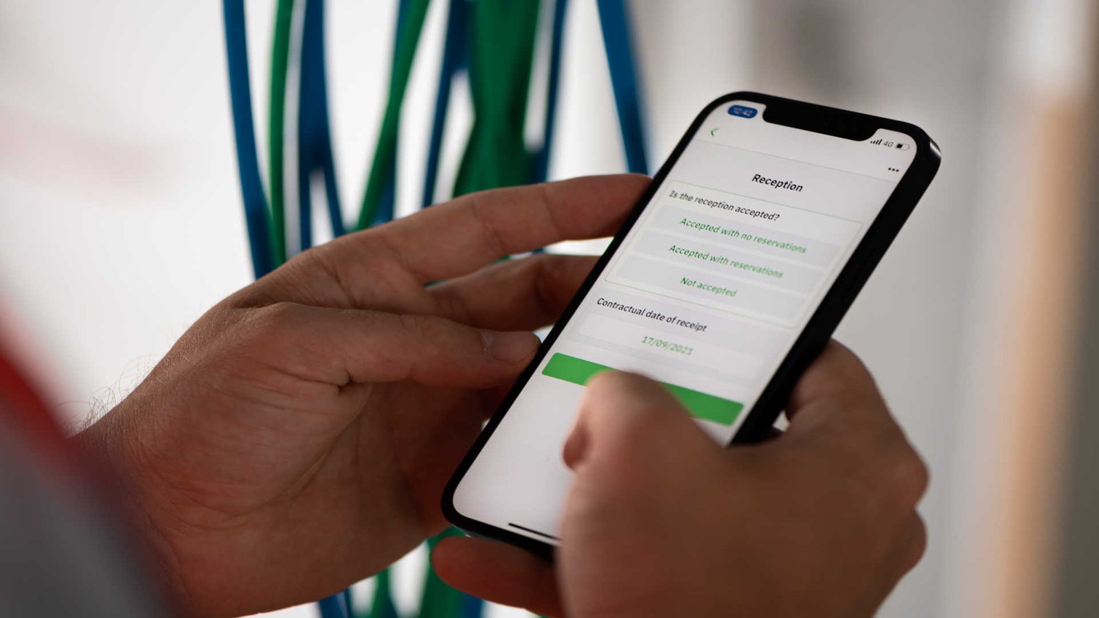 A close up shot of a mobile phone with the Causeway Ermeo app on screen